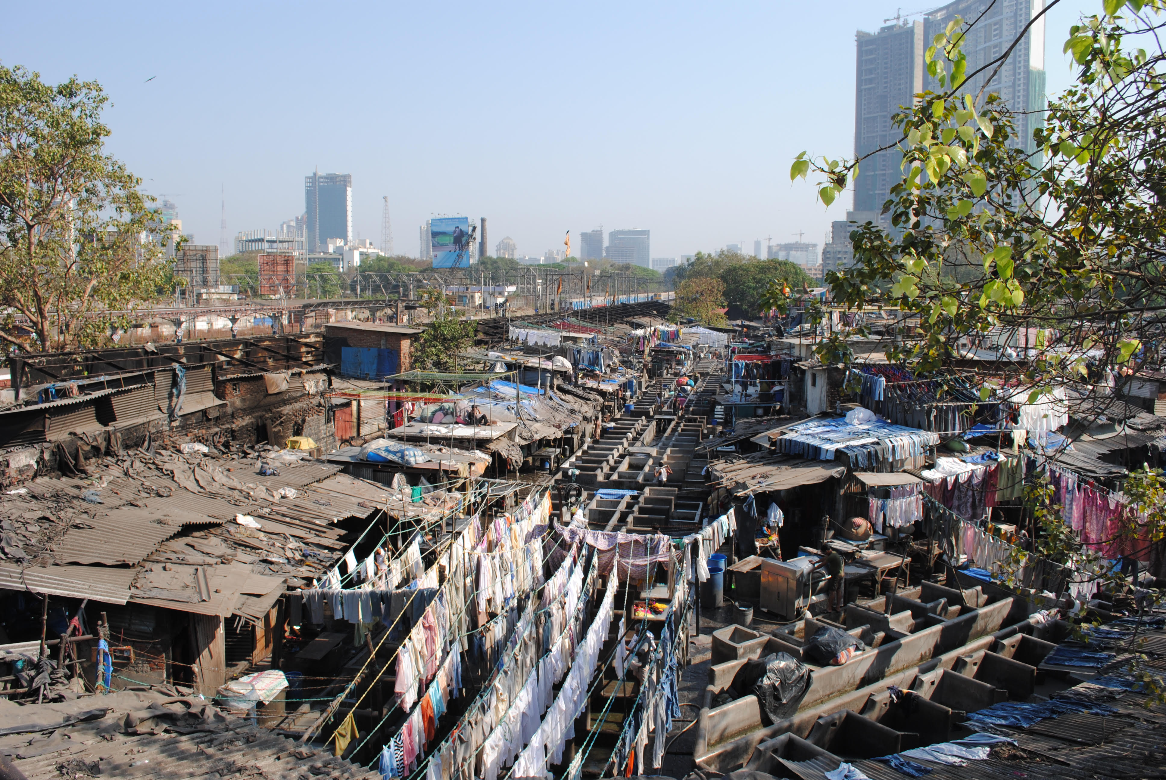 Reviving the post Covid-19 Indian Economy and the Twin Challenges of Informal Workers and Slums 