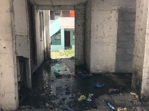 Social housing in Langa has fallen into disrepair. Photo Ashraf Hendriks GroundUp CC-BY-NC-ND. Many of the units have been captured by criminals and have been sublet. The City will not maintain the units unless there is a signed lease with a tenant