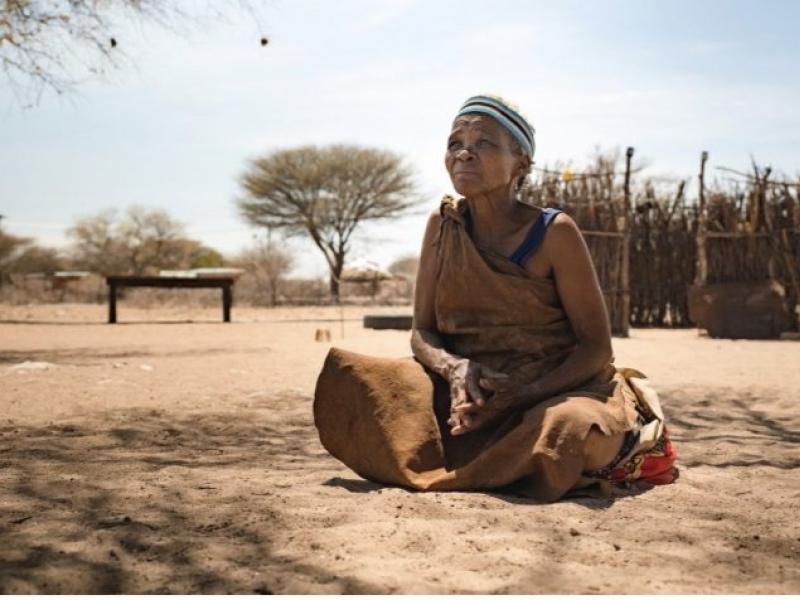Village elder Ncgabe Taase sitting in her backyard. Credits: Terjo Aaltonen, Location: D’Kar, Botswana.