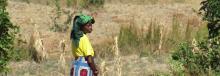 Woman stanfing in a farm