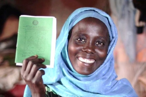 An Ethiopian female farmer with a land certificate